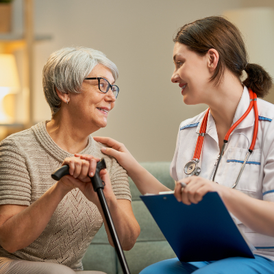 Caregiver supporting a senior patient